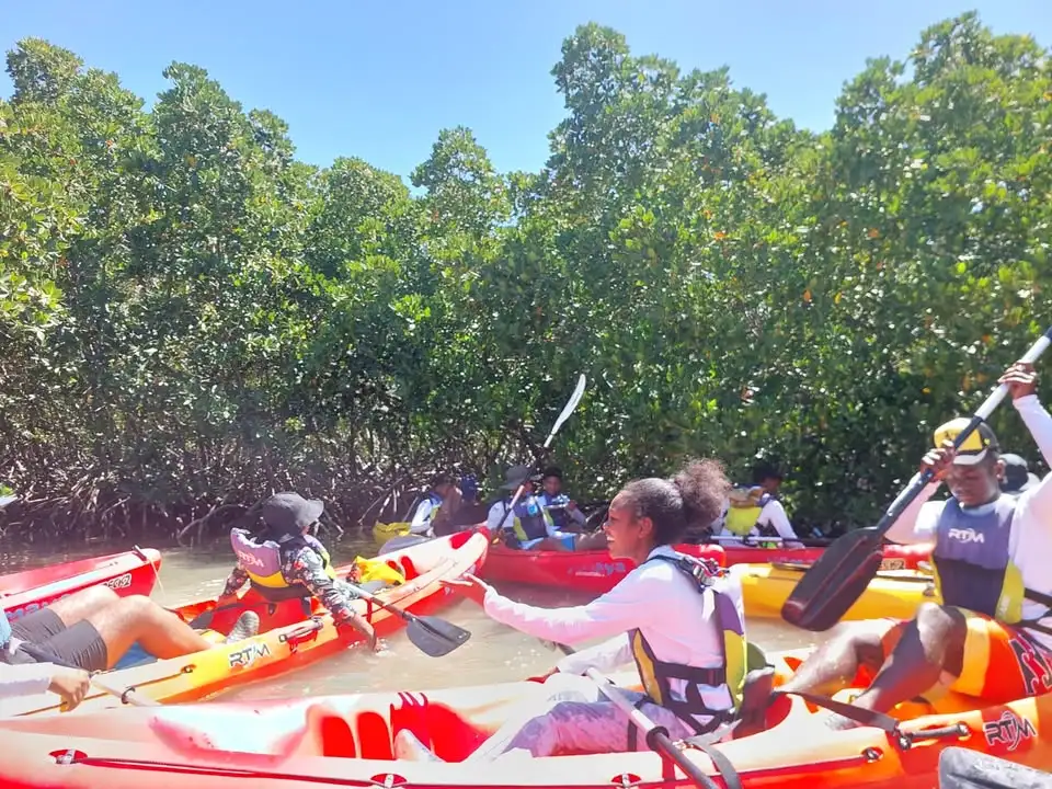 Students kayak in the mangroves - marine program with Reef Conservation